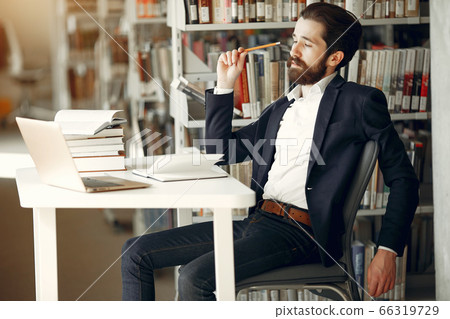Handsome guy study at the library Handsome guy study at the library 66319729