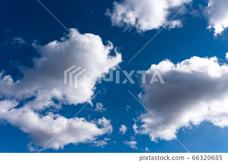 Beautiful sky with volumetric clouds, and the rays of the sun.  66320685