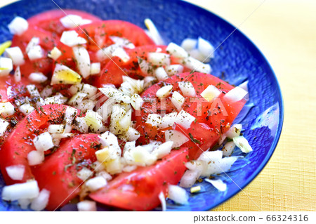 Ripe tomato salad with onion basil 66324316