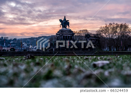 Colorful Sunrise burning sky Koblenz City historic monument German Corner where river rhine and mosele flow together 66324459