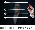 Businessman drawing arrows in different 66325584