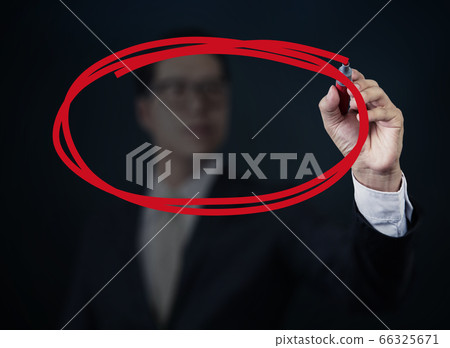 Businessman hand writing with red marker on Businessman hand writing with red marker on 66325671