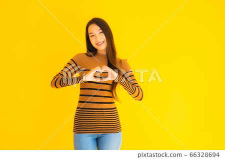 asian woman work from home with laptop cash and cardboard box ready for shipping of online asian woman work from home with laptop cash and cardboard box ready for shipping of online 66328694
