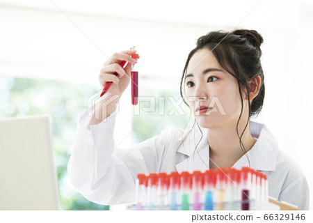 Female lab coat research experiment test tube Female lab coat research experiment test tube 66329146