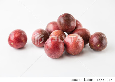 Fresh passion fruits-Healthy fruit on the white background Fresh passion fruits-Healthy fruit on the white background 66330047