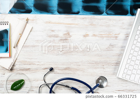 Doctors desktop with medical supplies Doctors desktop with medical supplies 66331725