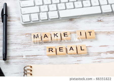 Make it real quote with letters on wooden cubes. Make it real quote with letters on wooden cubes. 66331822