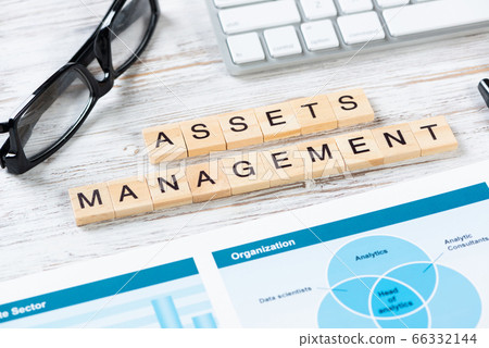 Asset management concept with letters on cubes 66332144