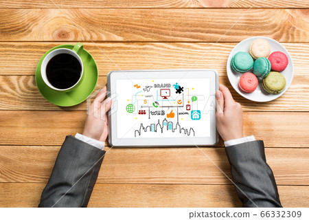 Businesswoman and her business notes Businesswoman and her business notes 66332309