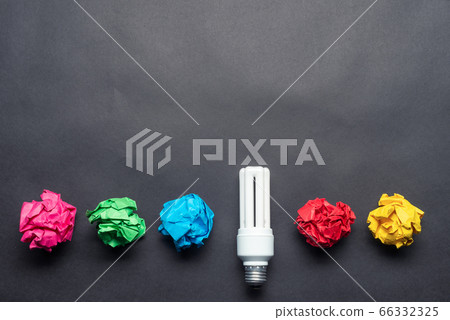 Fluorescent lamp and crumpled colorful paper balls Fluorescent lamp and crumpled colorful paper balls 66332325