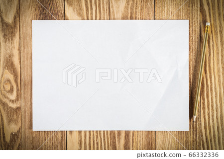 Flat lay wooden table with paper sheet 66332336