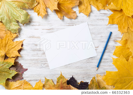 White paper sheet and pencil lies on desk White paper sheet and pencil lies on desk 66332363