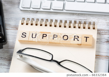 Customer support concept with letters on cubes Customer support concept with letters on cubes 66332364