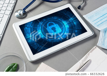 Web security and technology concept with tablet pc on table 66332626