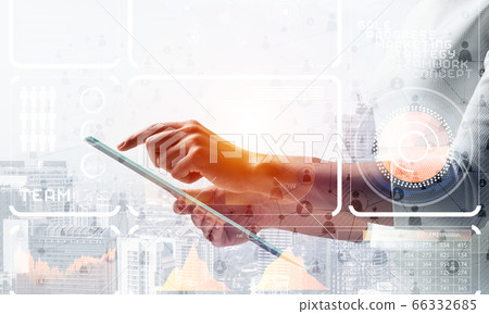 Businesswoman works with financial data 66332685