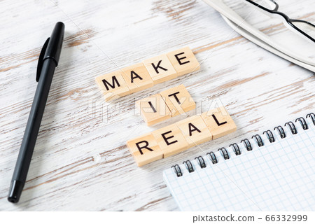 Make it real quote with letters on wooden cubes. Make it real quote with letters on wooden cubes. 66332999