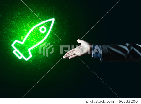 Man palm presenting Rocket web icon as technology concept 66333200