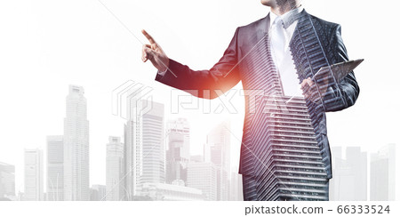 Businessman pointing on empty space 66333524