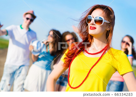 stylish young woman in sunglasses stylish young woman in sunglasses 66334283
