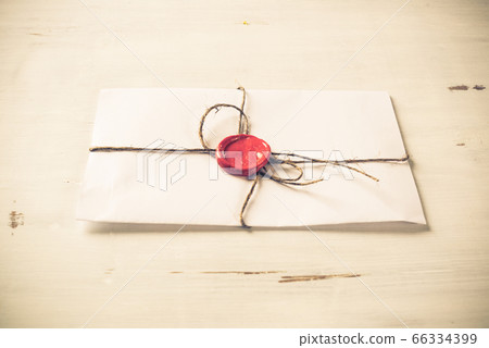 Letter with seal on table Letter with seal on table 66334399
