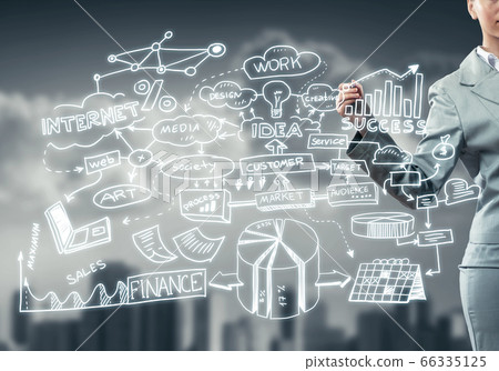 Woman sketching business ideas Woman sketching business ideas 66335125