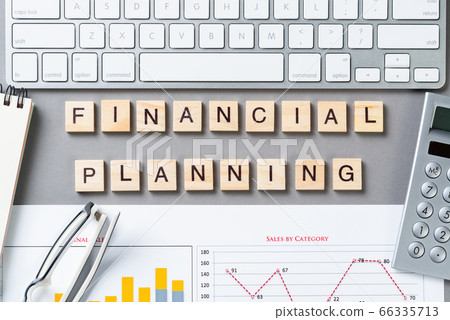 Financial planning concept with letters on cubes 66335713