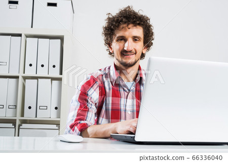 Man working in office Man working in office 66336040