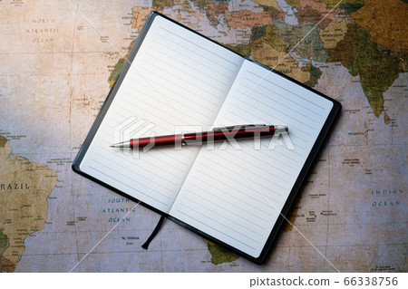 Notebook and World Map Business Tips 66338756