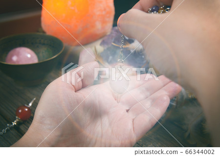 Palm reading with pendulum Palm reading with pendulum 66344002
