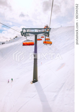 Chair ski lift in Saalbach Hinterglemm, Austria Chair ski lift in Saalbach Hinterglemm, Austria 66344362