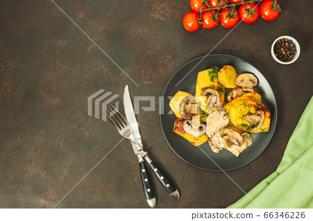Potato wedges baked with mushrooms, herb oven 66346226