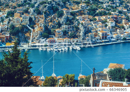 Panoramic view of the picturesque village on the Greek island of Symi, Dodecanese, Greece Panoramic view of the picturesque village on the Greek island of Symi, Dodecanese, Greece 66346905
