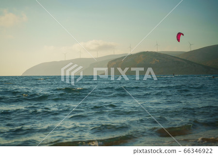 Kitesurfer riding on the waves at Prasonisi kite beach at Rhodes island 66346922