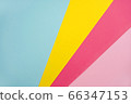 Bright trendy multicolor background from paper, blue, yellow, magenta, pink. Copy space 66347153