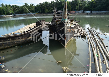 Cox's Bazar in Bangladesh Muslim village along the coast Boats carrying bamboo and fishing boats 66348299