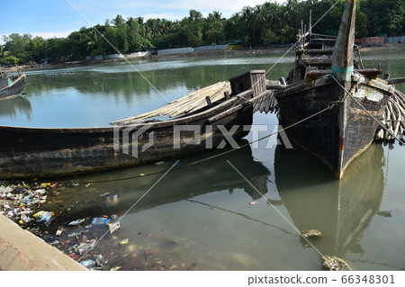 Cox's Bazar in Bangladesh Muslim village along the coast Boats carrying bamboo and fishing boats 66348301