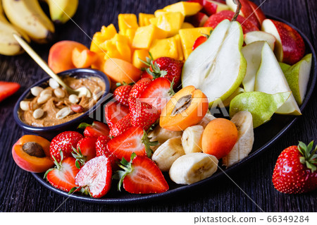 Rainbow fruit platter of fresh fruits and berries Rainbow fruit platter of fresh fruits and berries 66349284