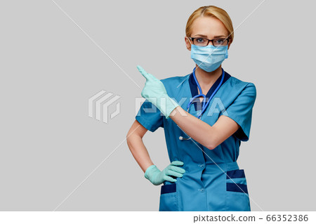 medical doctor nurse woman with stethoscope wearing protective mask and rubber or latex gloves 66352386