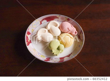 Dried sweets on a small plate 66352412