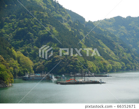 Work boat floating on the river 66352671