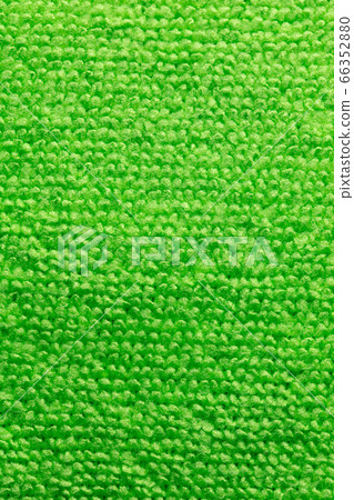 Green fabric as an abstract background. Green fabric as an abstract background. 66352880
