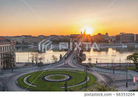 Budapest Hungary, city skyline sunrise at Danube River with Chain Bridge and St. Stephen's Basilica Budapest Hungary, city skyline sunrise at Danube River with Chain Bridge and St. Stephen's Basilica 66353204