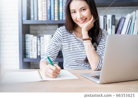 Young pretty woman library work memo smile book reading person material Young pretty woman library work memo smile book reading person material 66353825
