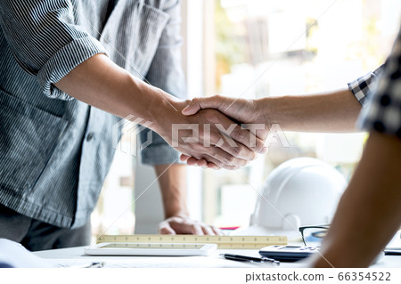 Finishing up a meeting, Two engineer or architect 66354522