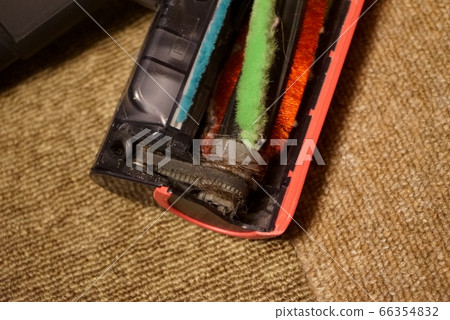 Vacuum cleaner head with tangled hair Vacuum cleaner head with tangled hair 66354832