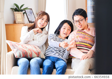 Family watching TV 66354938