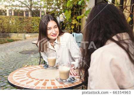 Close-up face of girl looking at her friend oudoor 66354963