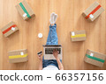 Top view of women working laptop computer from home with postal parcel, Ecommerce ideas concept 66357156