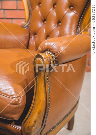 Antique armchair furniture with cushion against Antique armchair furniture with cushion against 66357213