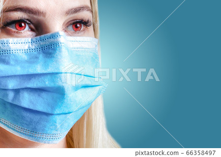 Cropped image of female physician wearing medical mask Cropped image of female physician wearing medical mask 66358497